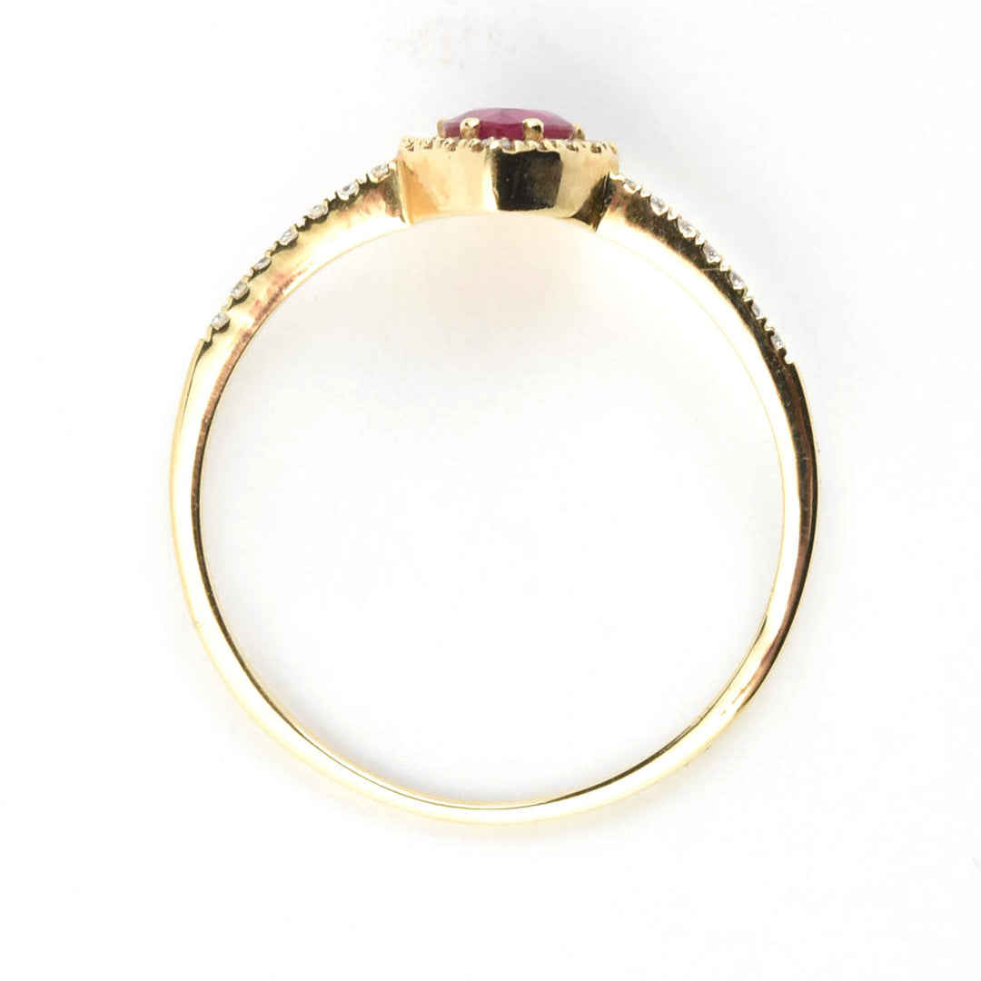 Ruby & Diamond Halo Ring in 14k Yellow Gold