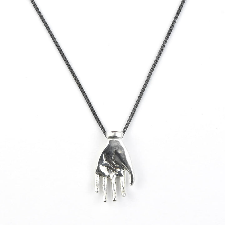 "The Moneymaker" Antiqued Silver Hand Talisman with Ruby