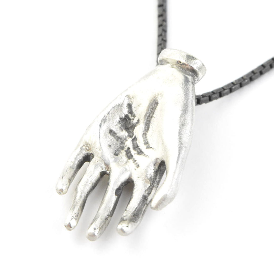 "The Moneymaker" Antiqued Matte Silver Hand Talisman with Ruby - Goldmakers Fine Jewelry