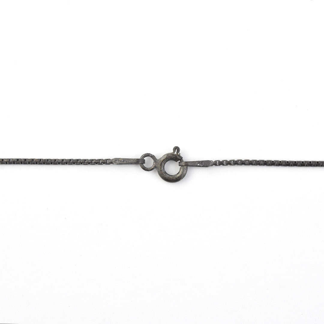 "The Moneymaker" Antiqued Matte Silver Hand Talisman with Ruby - Goldmakers Fine Jewelry