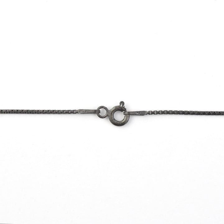 "The Moneymaker" Antiqued Matte Silver Hand Talisman with Ruby - Goldmakers Fine Jewelry