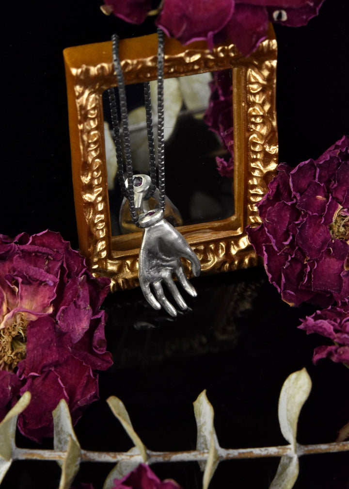 "The Moneymaker" Antiqued Matte Silver Hand Talisman with Ruby - Goldmakers Fine Jewelry