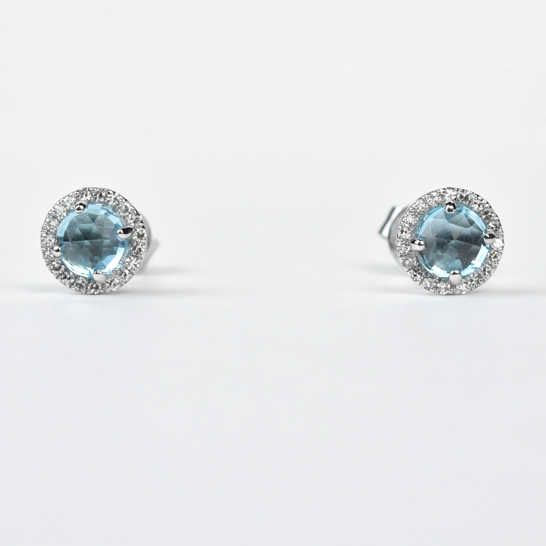 Blue Topaz and Diamond Halo Studs in White Gold - Goldmakers Fine Jewelry