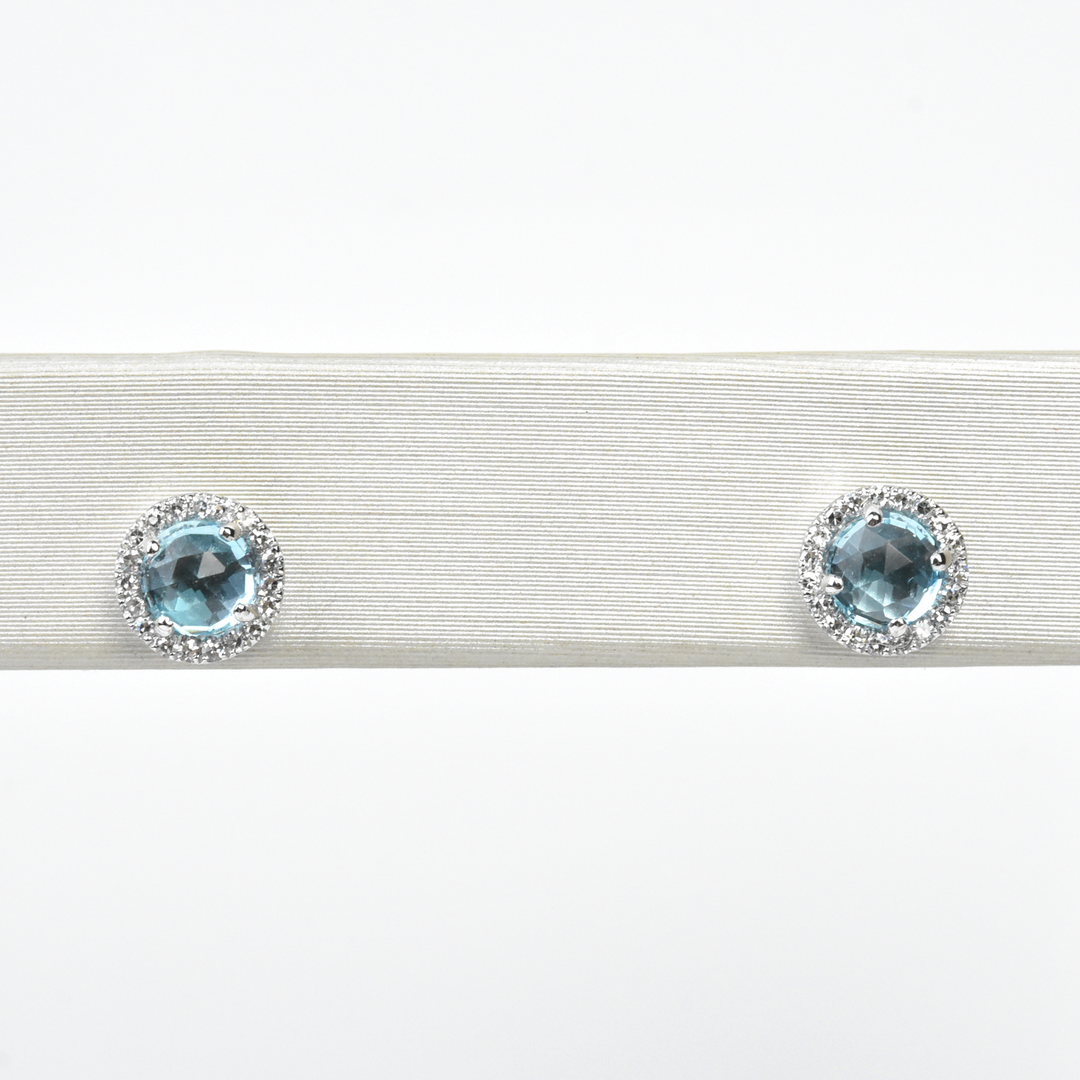 Blue Topaz and Diamond Halo Studs in White Gold - Goldmakers Fine Jewelry
