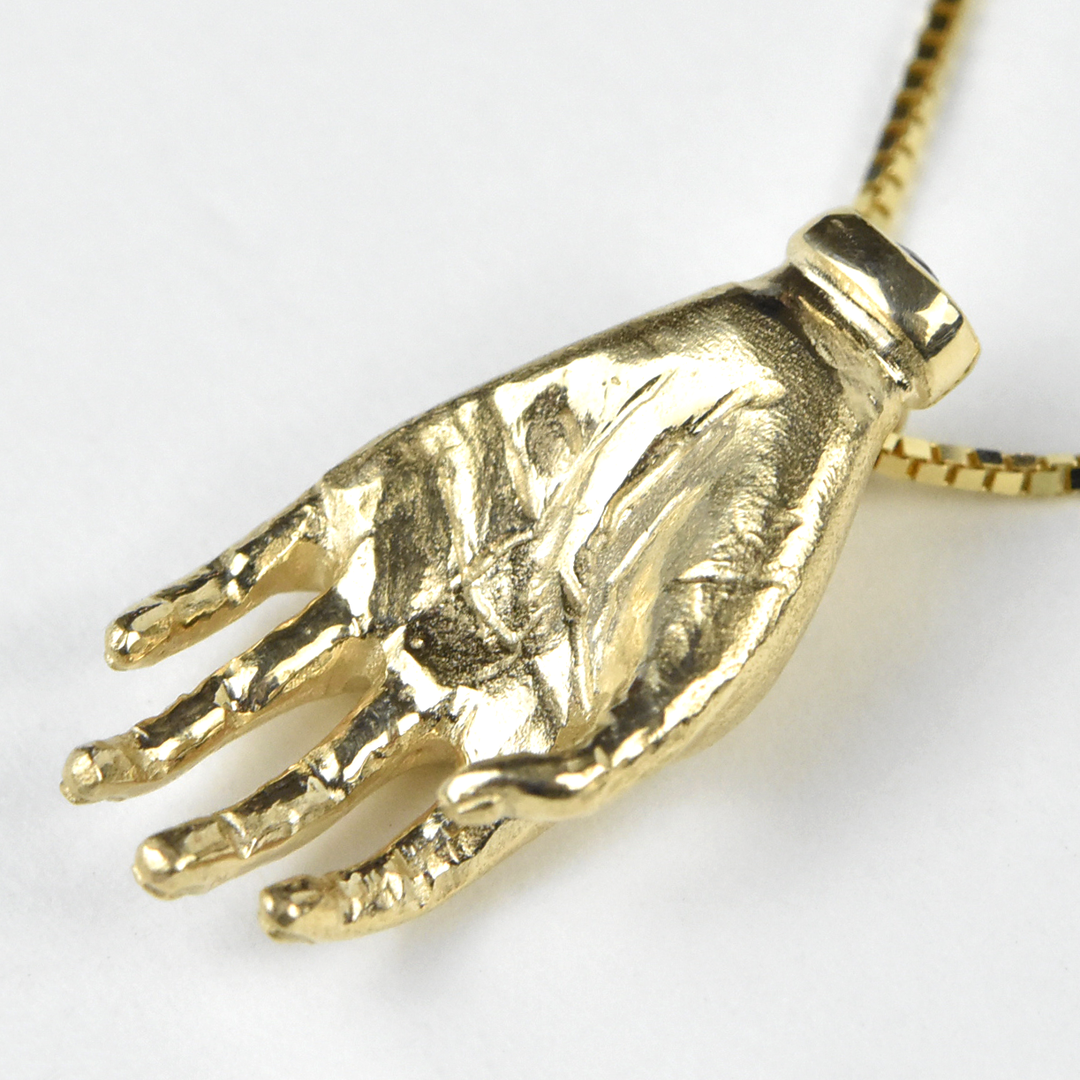 "The Moneymaker" Solid Gold Hand Talisman with Ruby - Goldmakers Fine Jewelry