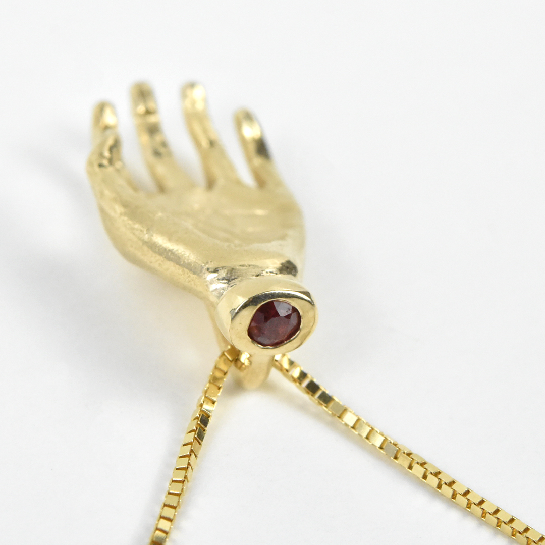 "The Moneymaker" Solid Gold Hand Talisman with Ruby - Goldmakers Fine Jewelry